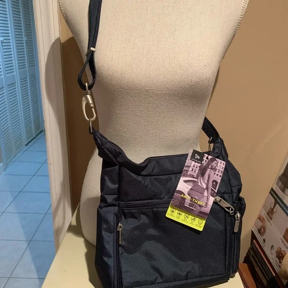 Travelon Blue Messenger Bag with Sleek Design - Picture 3 of 8